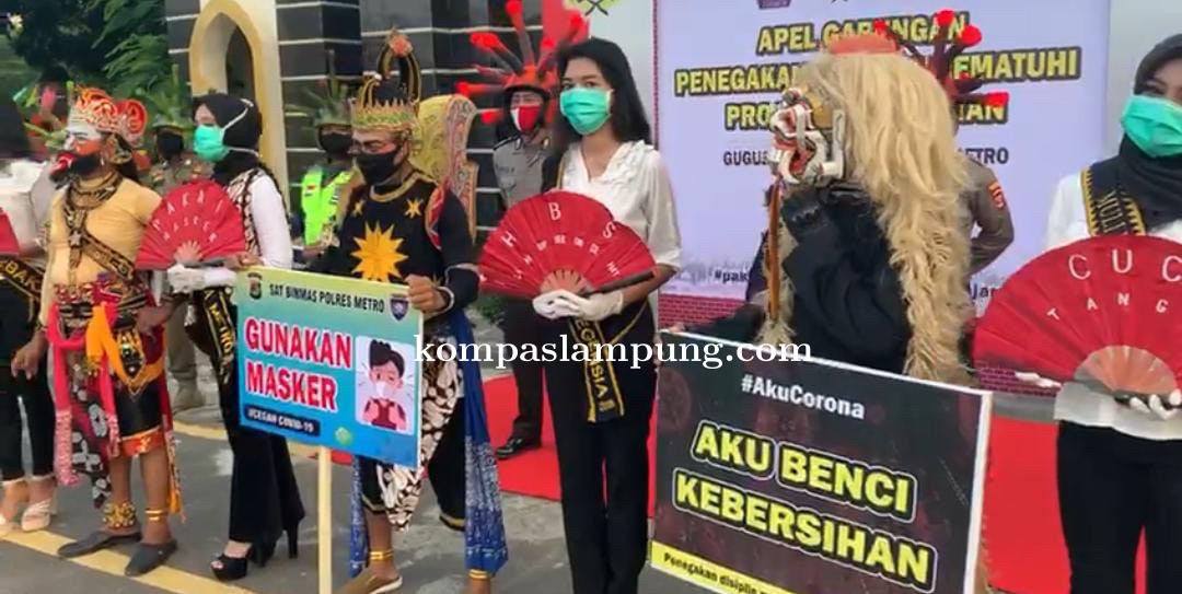 Sambut New Normal Karakter Animasi Warnai Apel Gabungan Covid-19 Di Kota Metro